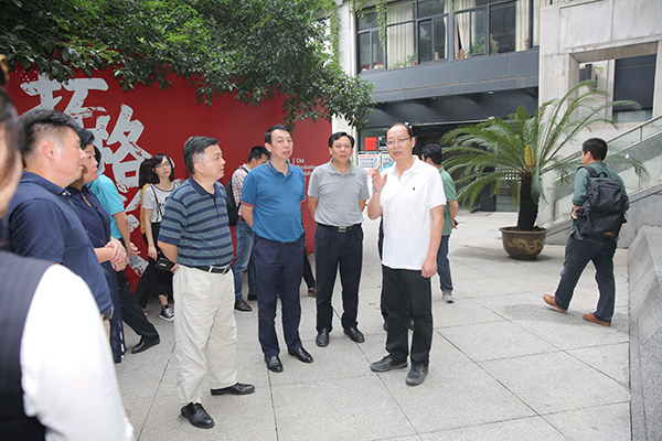 广东省梅州市政协领导周秋明一行来访我院